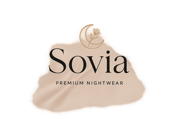 "Minimalist luxury logo design for a premium women’s nightwear brand named Sovia. Elegant serif or script typography, soft curves, modern and timeless feel. Use a simple, clean design with a touch of sensuality. Colors: black, gold, or nude tones for a sophisticated aesthetic. Include subtle details like a crescent moon, silk texture, or delicate floral accent, but keep the overall design simple, unique, and luxurious. High-end fashion brand style."